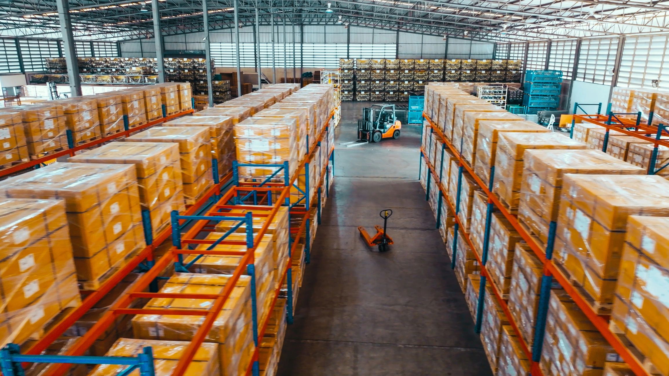 Warehouse shelving and inventory representing organized aircraft parts distribution