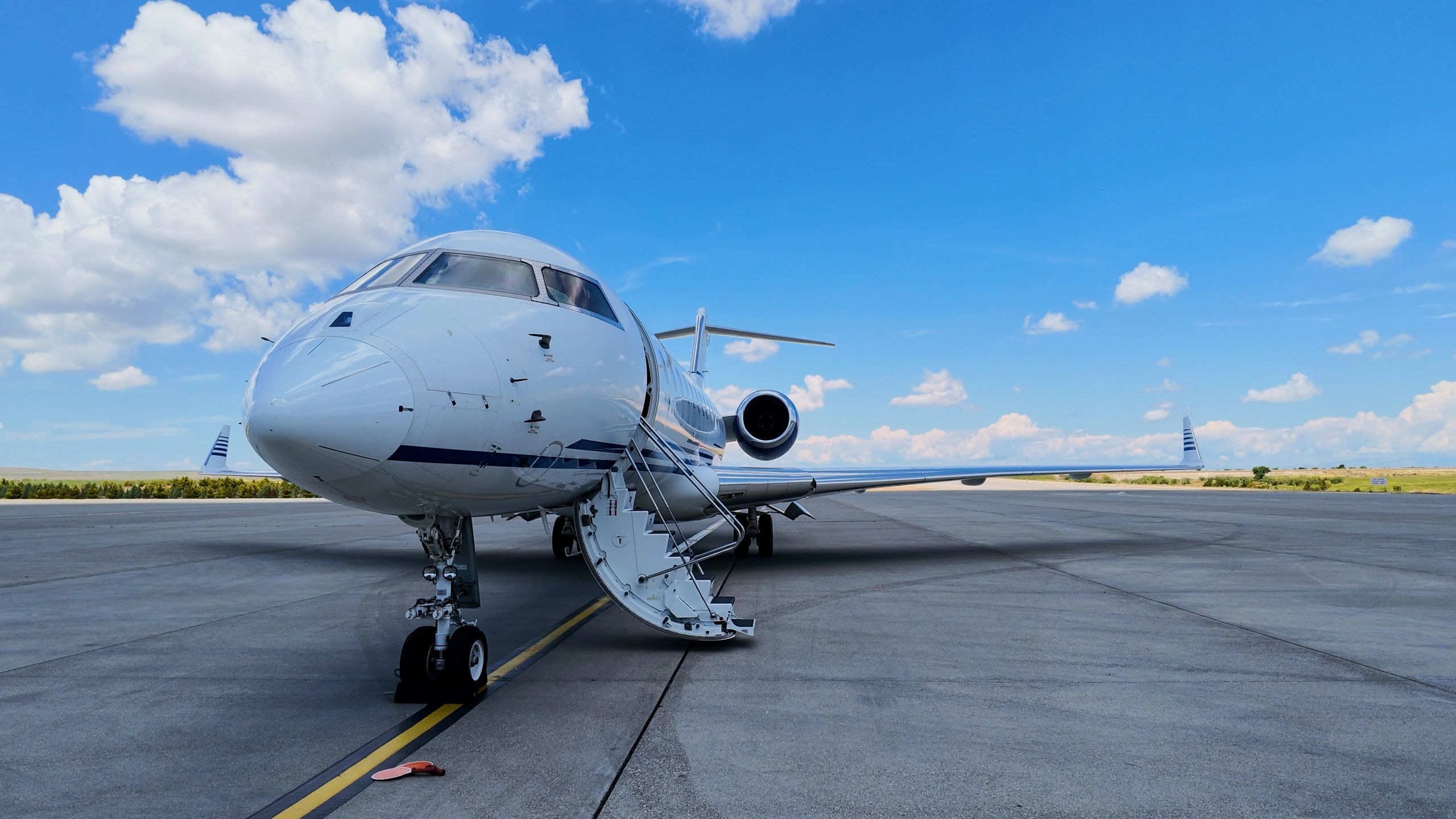 Corporate private jet parked on airport apron